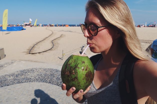 Drink uit een kokosnoot op de Copacabana