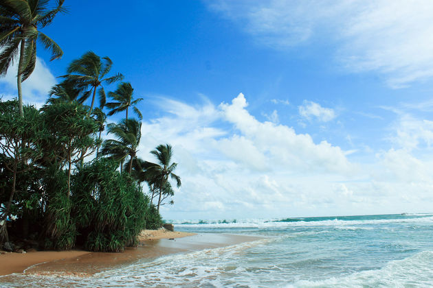 Het strand van Hikkaduwa